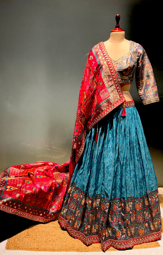 ( DELIVERY IN 15-20 DAYS ) TURQUOISE COLOUR DOLA SILK LEHENGA WITH READYMADE BLOUSE EMBELLISHED WITH MIRROR WORK