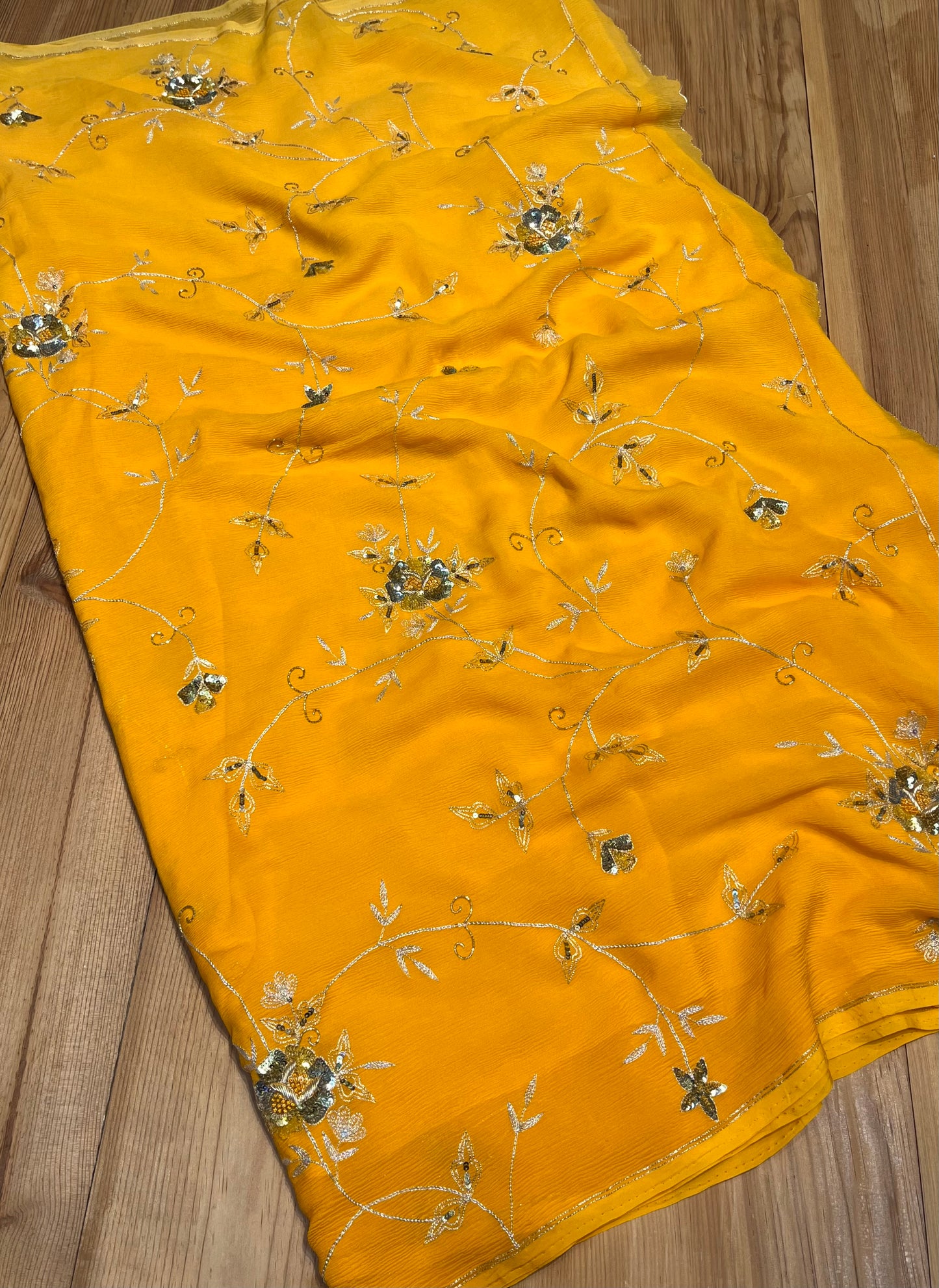 YELLOW SHADED PURE CHIFFON HAND EMBROIDERED SAREE EMBELLISHED WITH SEQUINS, AARI & ZARDOZI WORK