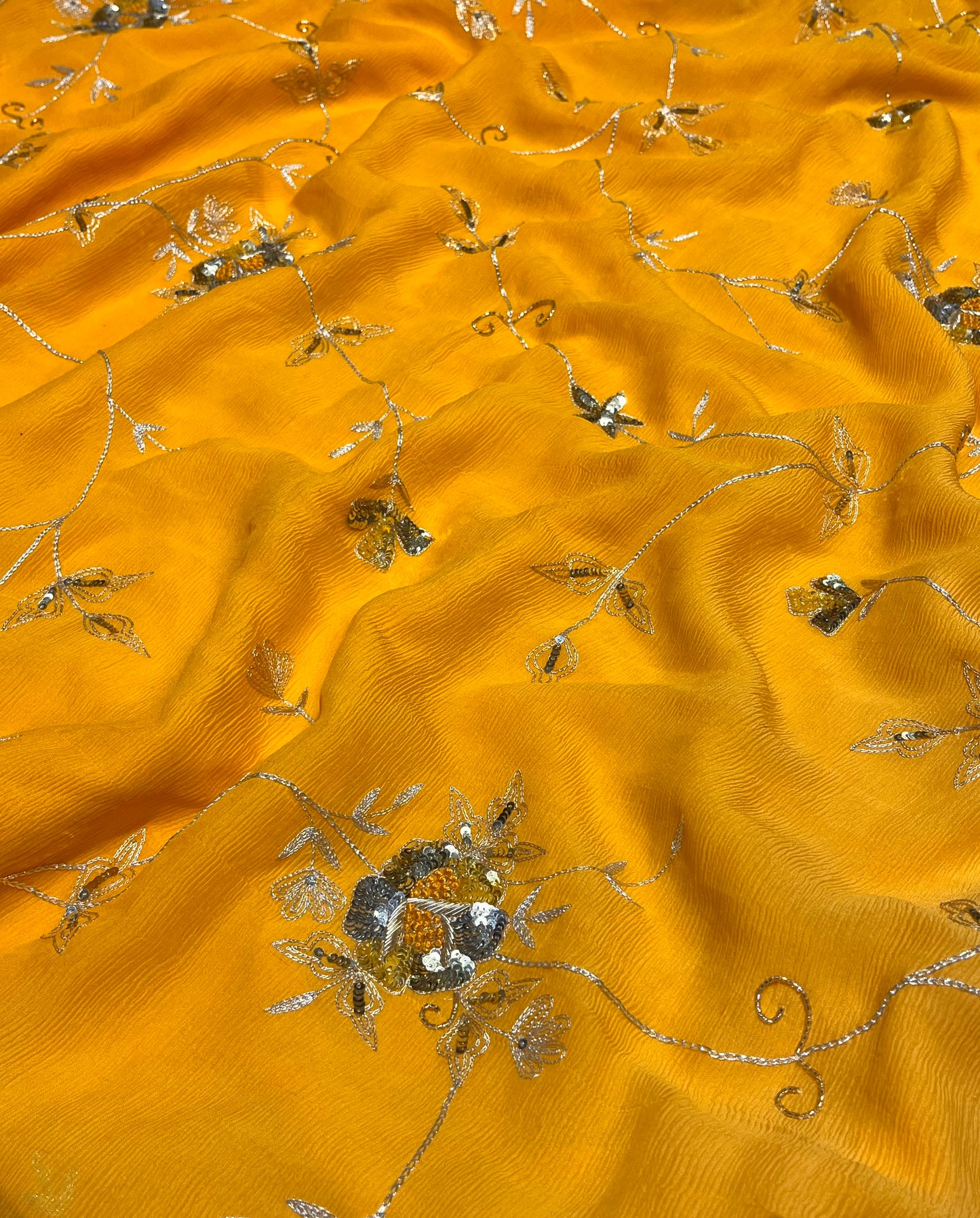 YELLOW SHADED PURE CHIFFON HAND EMBROIDERED SAREE EMBELLISHED WITH SEQUINS, AARI & ZARDOZI WORK