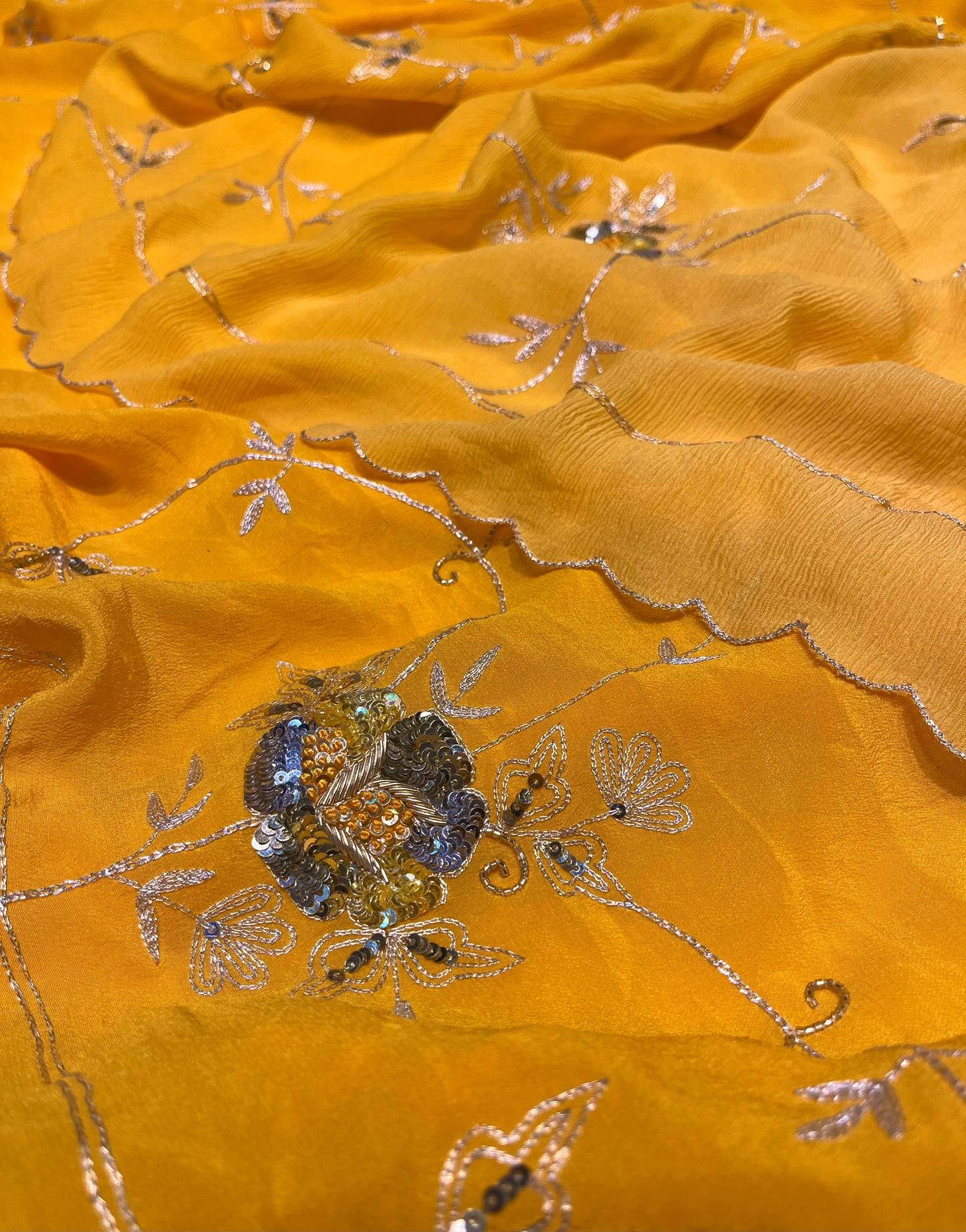 YELLOW SHADED PURE CHIFFON HAND EMBROIDERED SAREE EMBELLISHED WITH SEQUINS, AARI & ZARDOZI WORK