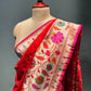 RED COLOUR PURE SILK PAITHANI SAREE EMBELLISHED WITH ZARI WEAVES