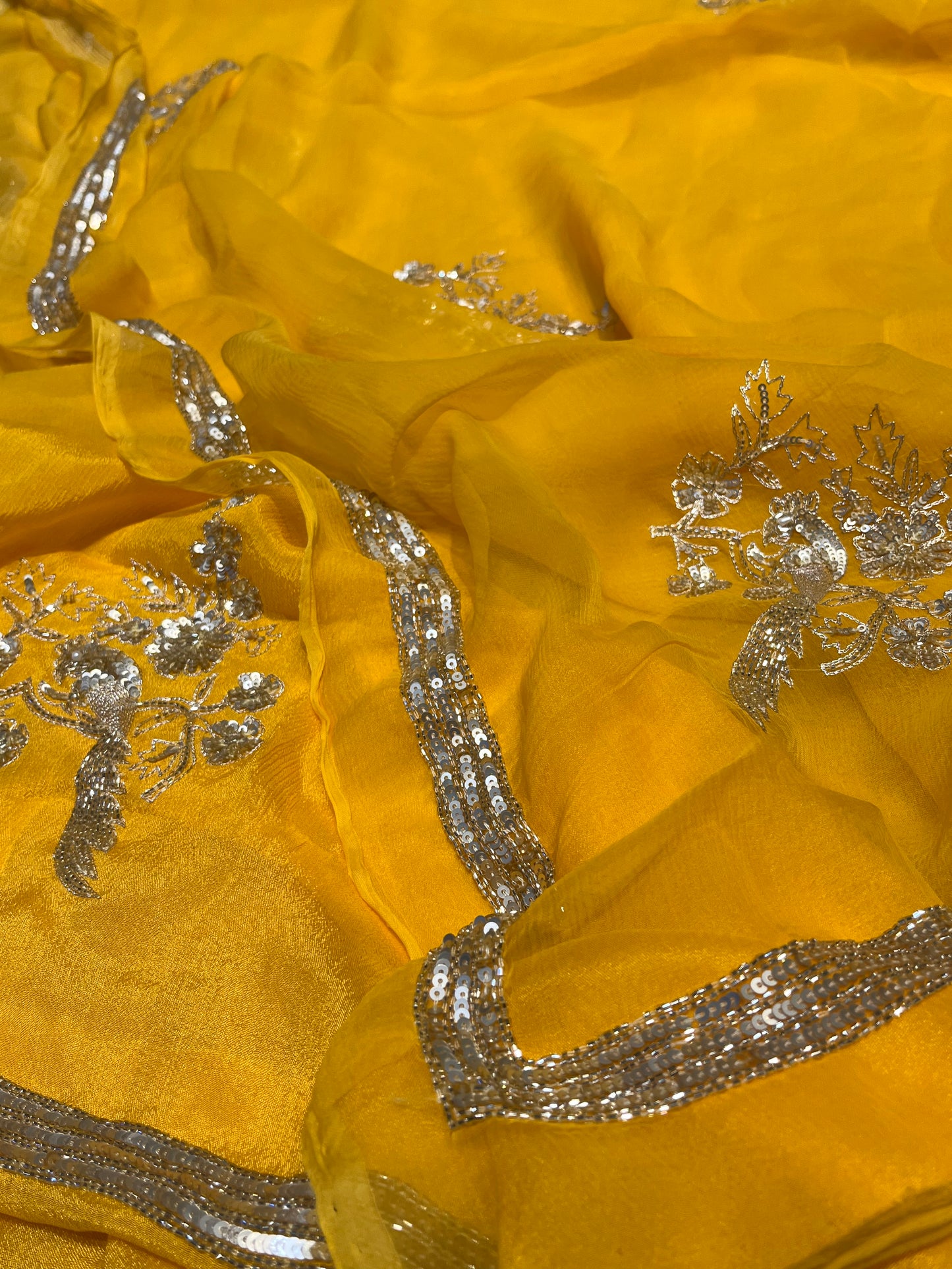 YELLOW CHIFFON HAND EMBROIDERED SAREE EMBELLISHED WITH SEQUINS & CUTDANA WORK