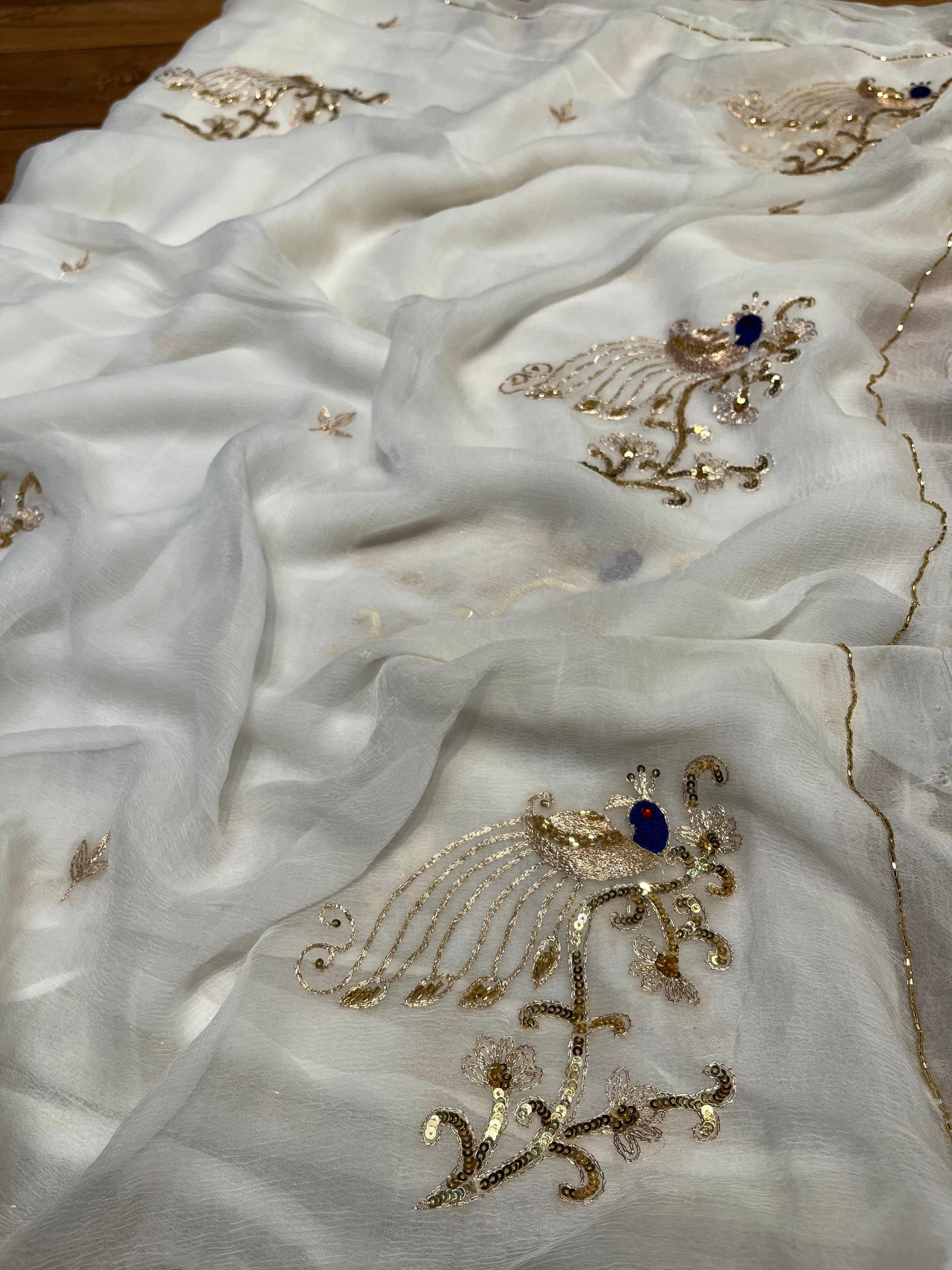 WHITE COLOUR EMBROIDERED CHIFFON SAREE WITH CHINON BLOUSE EMBELLISHED WITH AARI & SEQUINS WORK