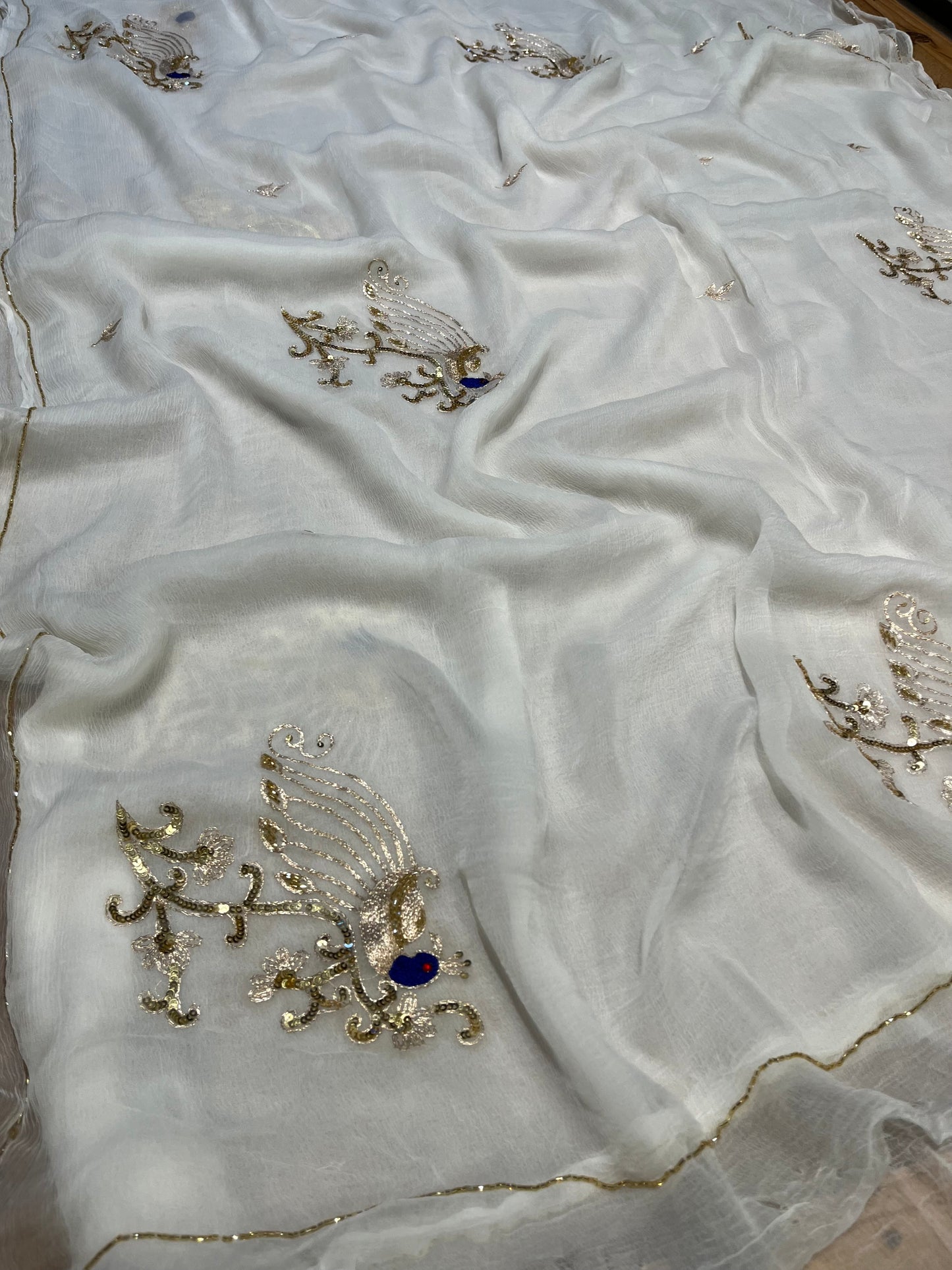 WHITE COLOUR EMBROIDERED CHIFFON SAREE WITH CHINON BLOUSE EMBELLISHED WITH AARI & SEQUINS WORK