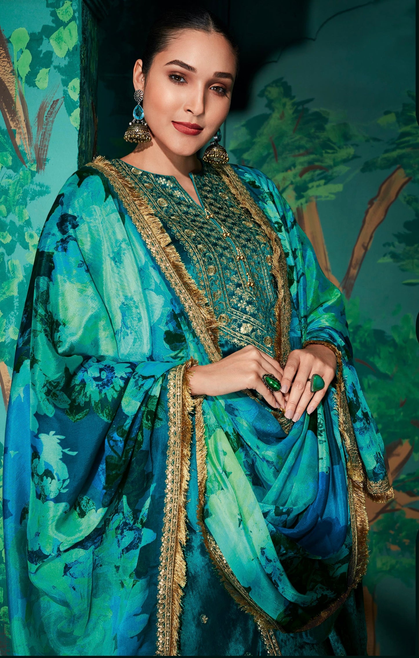 Unstiched Teal Blue velvet kurta with floral chinnon, lace border Dupatta & unstiched bottom fabric with lace border.