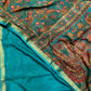 TEAL COLOUR ART CREPE SILK PRINTED SAREE WITH ZARI BORDER (DELIVERY TIME 15 DAYS)