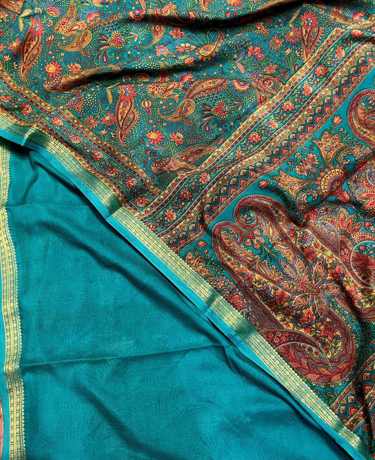 TEAL COLOUR ART CREPE SILK PRINTED SAREE WITH ZARI BORDER (DELIVERY TIME 15 DAYS)