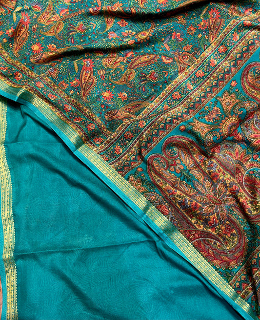 TEAL COLOUR ART CREPE SILK PRINTED SAREE WITH ZARI BORDER (DELIVERY TIME 15 DAYS)