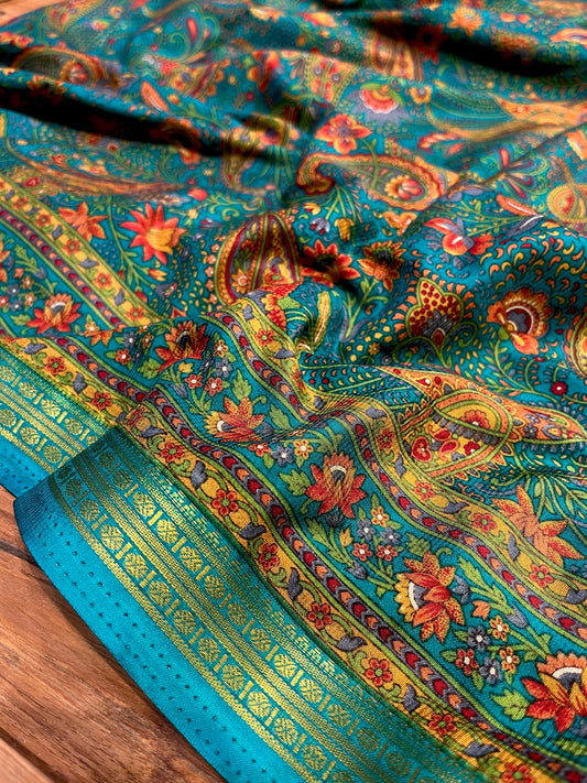 TEAL COLOUR ART CREPE SILK PRINTED SAREE WITH ZARI BORDER (DELIVERY TIME 15 DAYS)