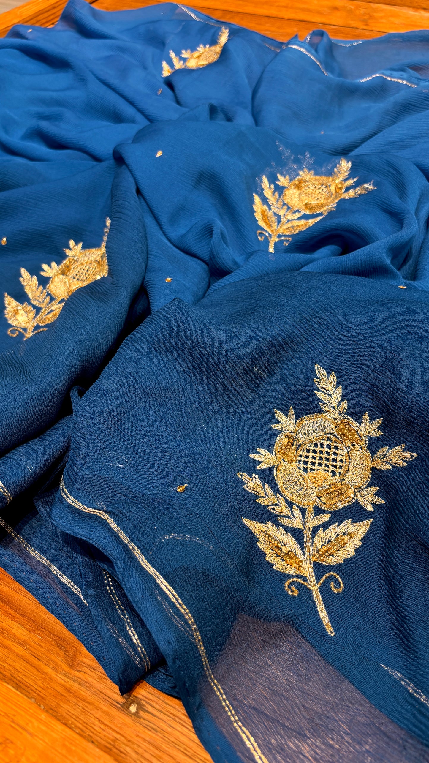 TEAL BLUE SHADED PURE CHIFFON HAND EMBROIDERED SAREE WITH CREPE SILK BLOUSE EMBELLISHED WITH AARI & SEQUINS WORK