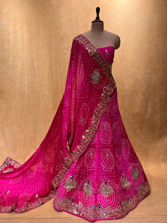 ( DELIVERY IN 25 DAYS ) PINK COLOUR SHADED PURE OJARIYA BANDHANI LEHENGA EMBELLISHED WITH GOTA PATTI & CUTDANA WORK