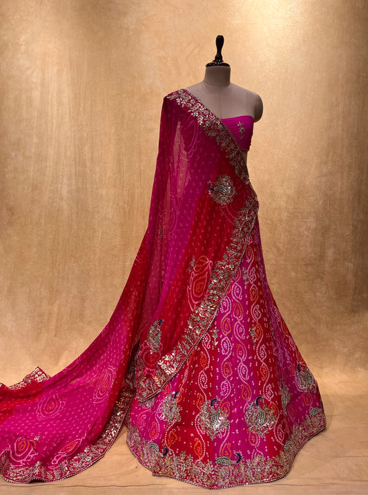 SHADED PURE OJARIYA BANDHANI LEHENGA EMBELLISHED WITH GOTA PATTI & CUTDANA WORK