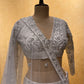 WHITE COLOUR NET EMBROIDERED LEHENGA EMBELLISHED WITH SEQUINS & ZARI WORK