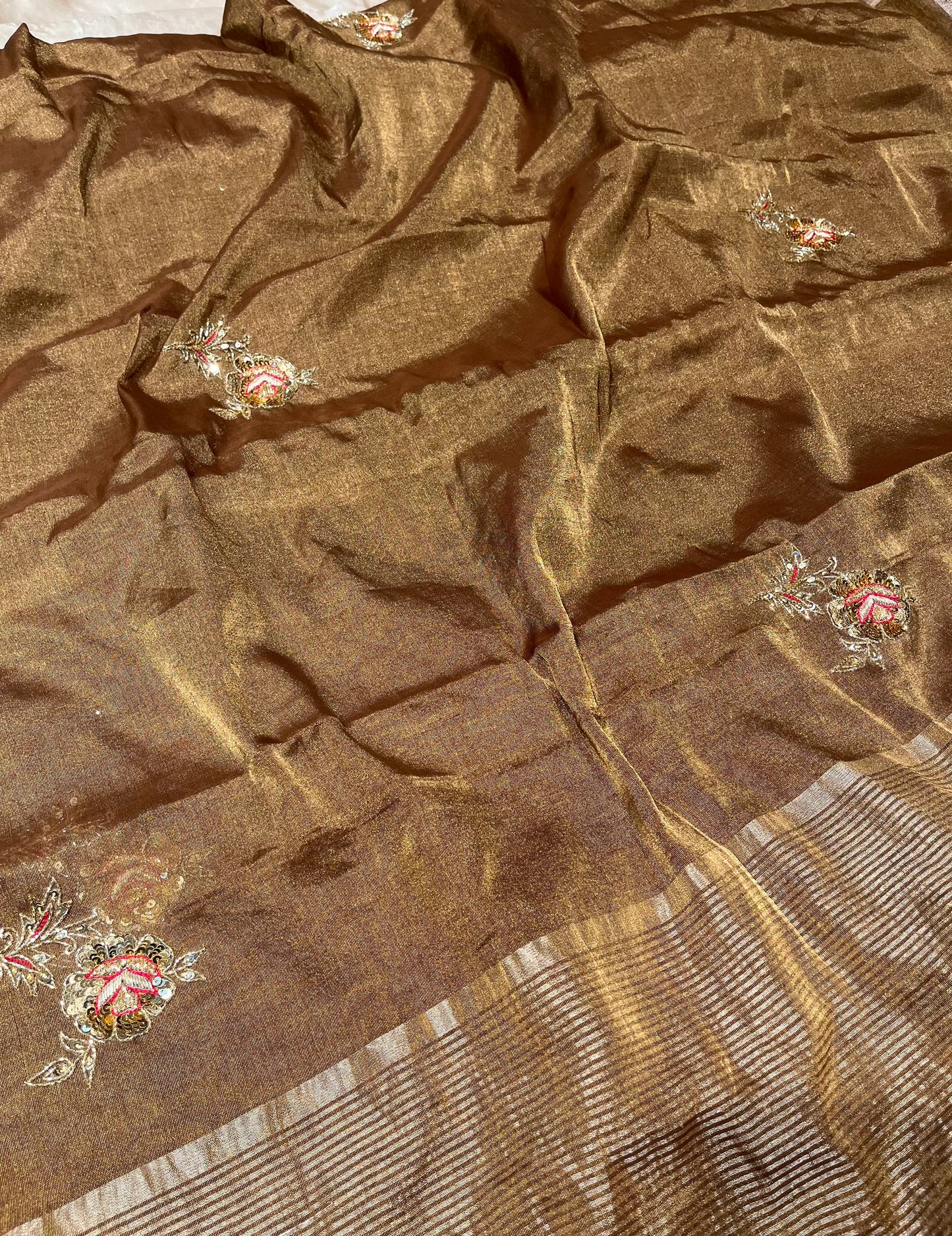 GOLDEN COPPER TISSUE HAND EMBROIDERED SAREE EMBELLISHED WITH CUTDANA & SEQUINS WORK