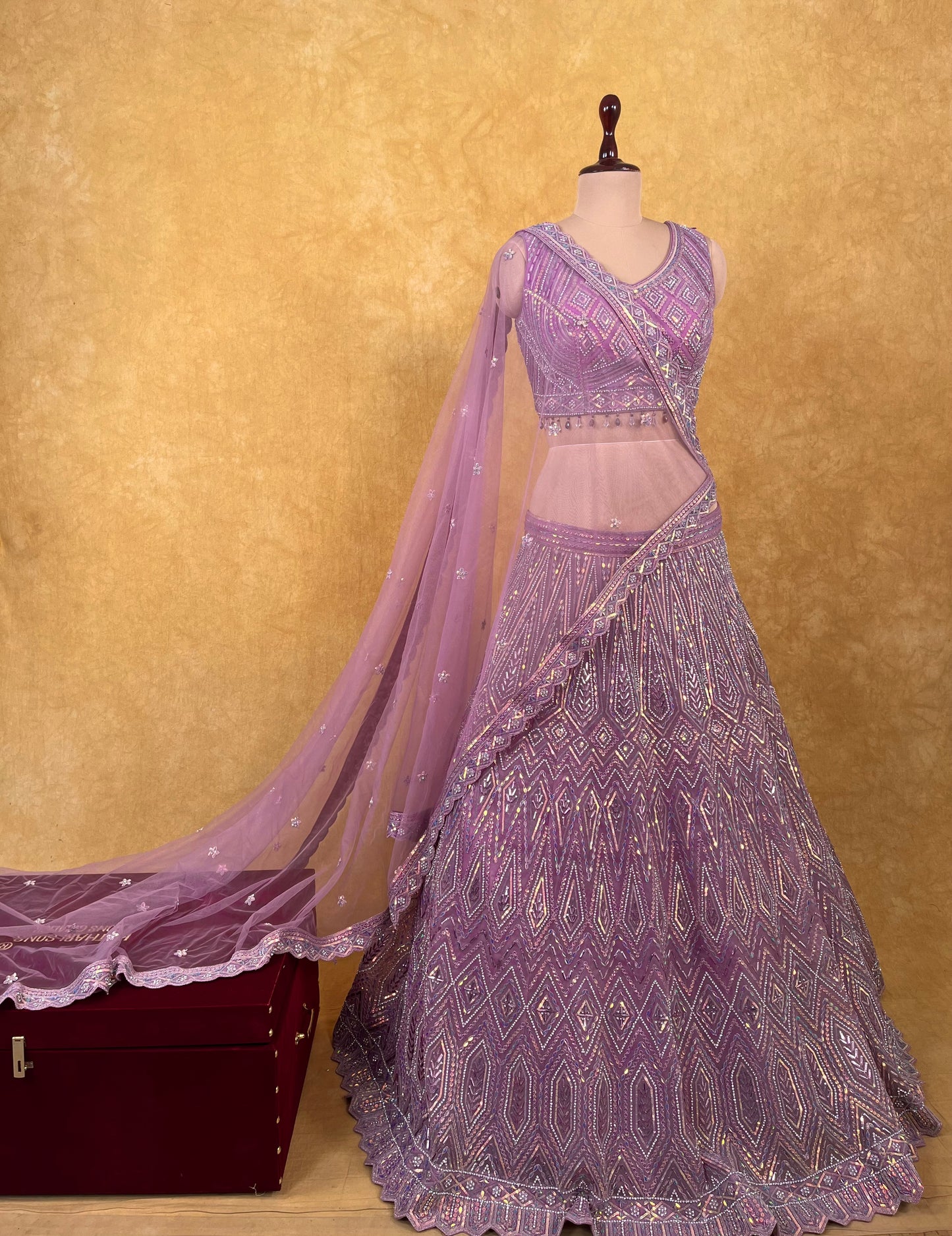 LAVENDER COLOUR NET EMBROIDERED LEHENGA WITH READYMADE BLOUSE EMBELLISHED WITH SEQUINS WORK