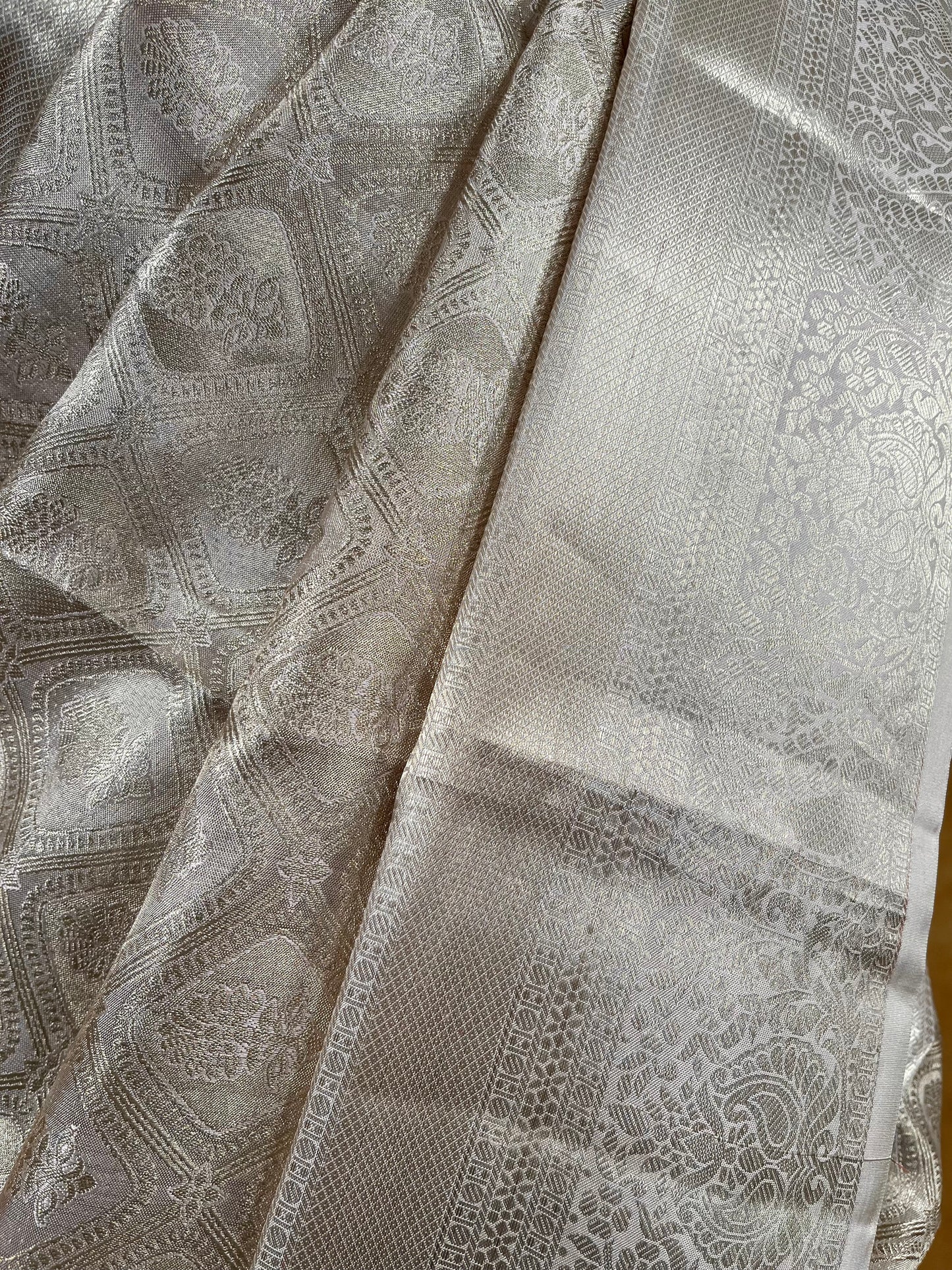 SILVER COLOUR PURE KANJIVARAM SAREE EMBELLISHED WITH ZARI WEAVES