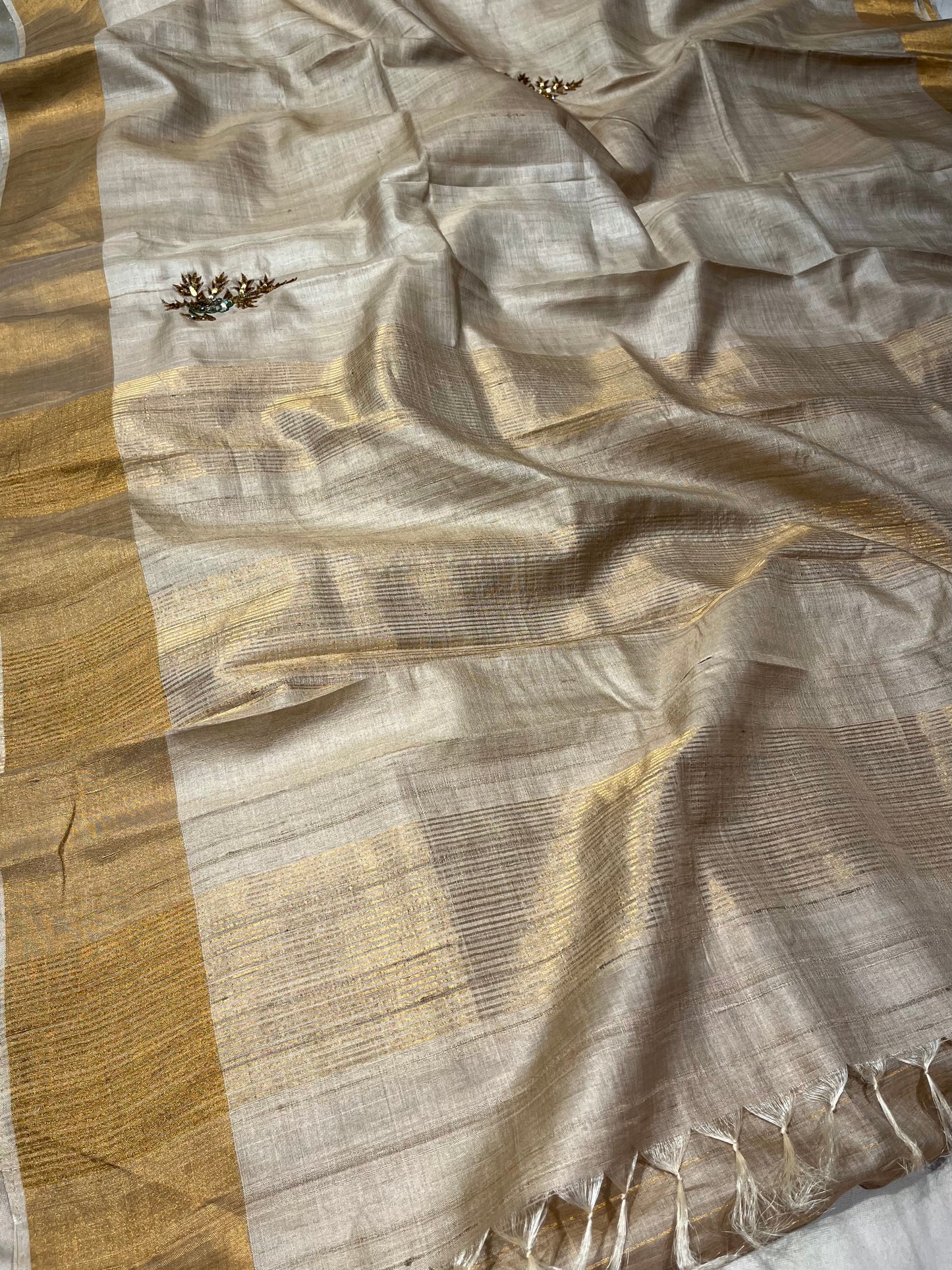 IVORY COLOUR PURE TUSSAR SILK HAND EMBROIDERED SAREE EMBELLISHED WITH SEQUINS WORK - Kothari Sons