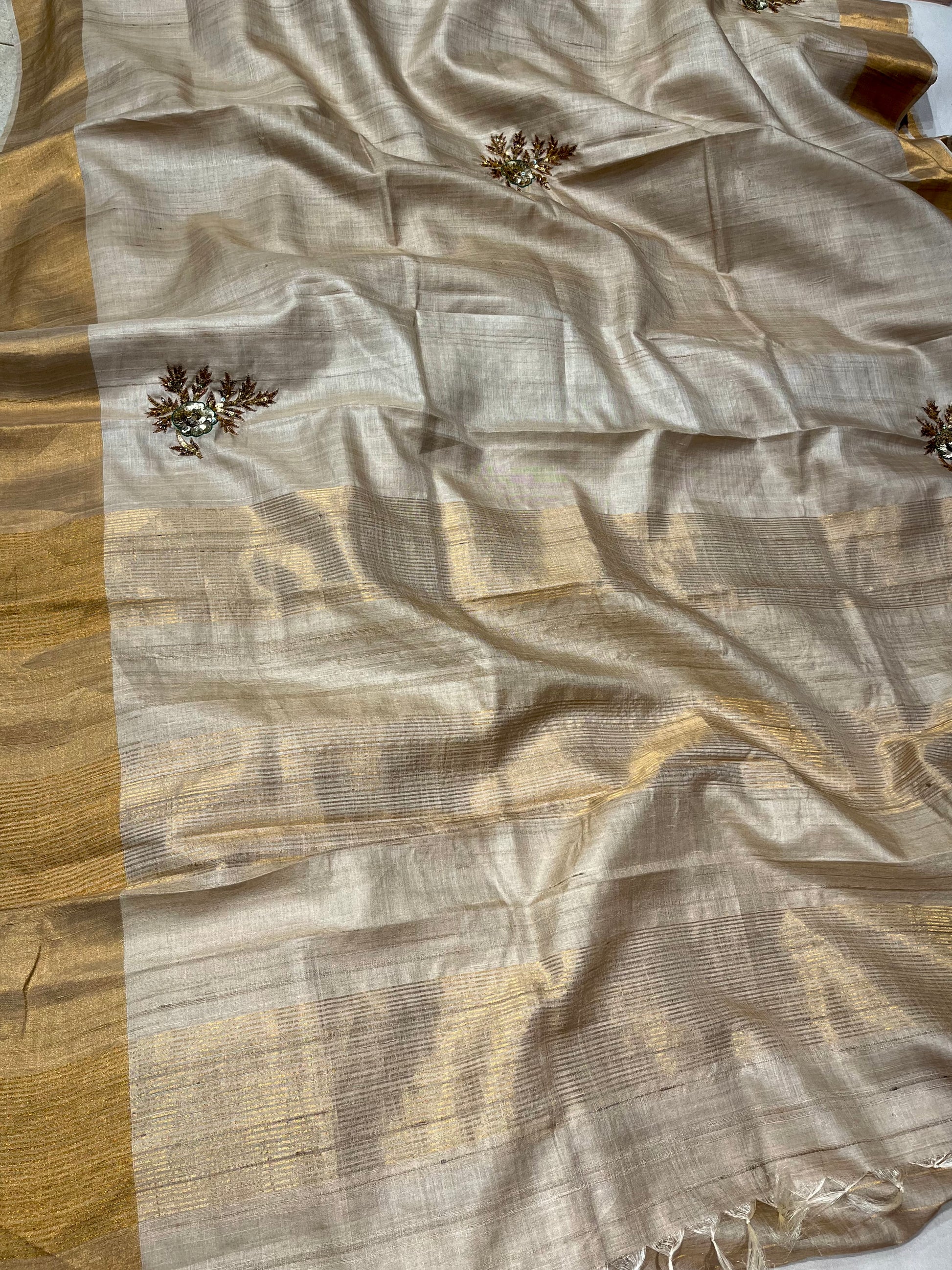 IVORY COLOUR PURE TUSSAR SILK HAND EMBROIDERED SAREE EMBELLISHED WITH SEQUINS WORK - Kothari Sons