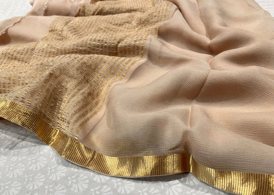 ( DELIVERY IN 25 DAYS ) BEIGE COLOUR PURE CHIFFON SAREE WITH ZARI BORDER