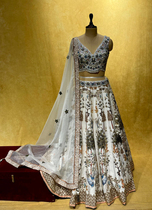 WHITE COLOR SILK LEHENGA WITH CROP TOP BLOUSE & ORGANZA DUPATTA EMBELLISHED WITH MIRROR, SEQUINS & AARI WORK ( WHITE LEHENGA PARTY WEAR )