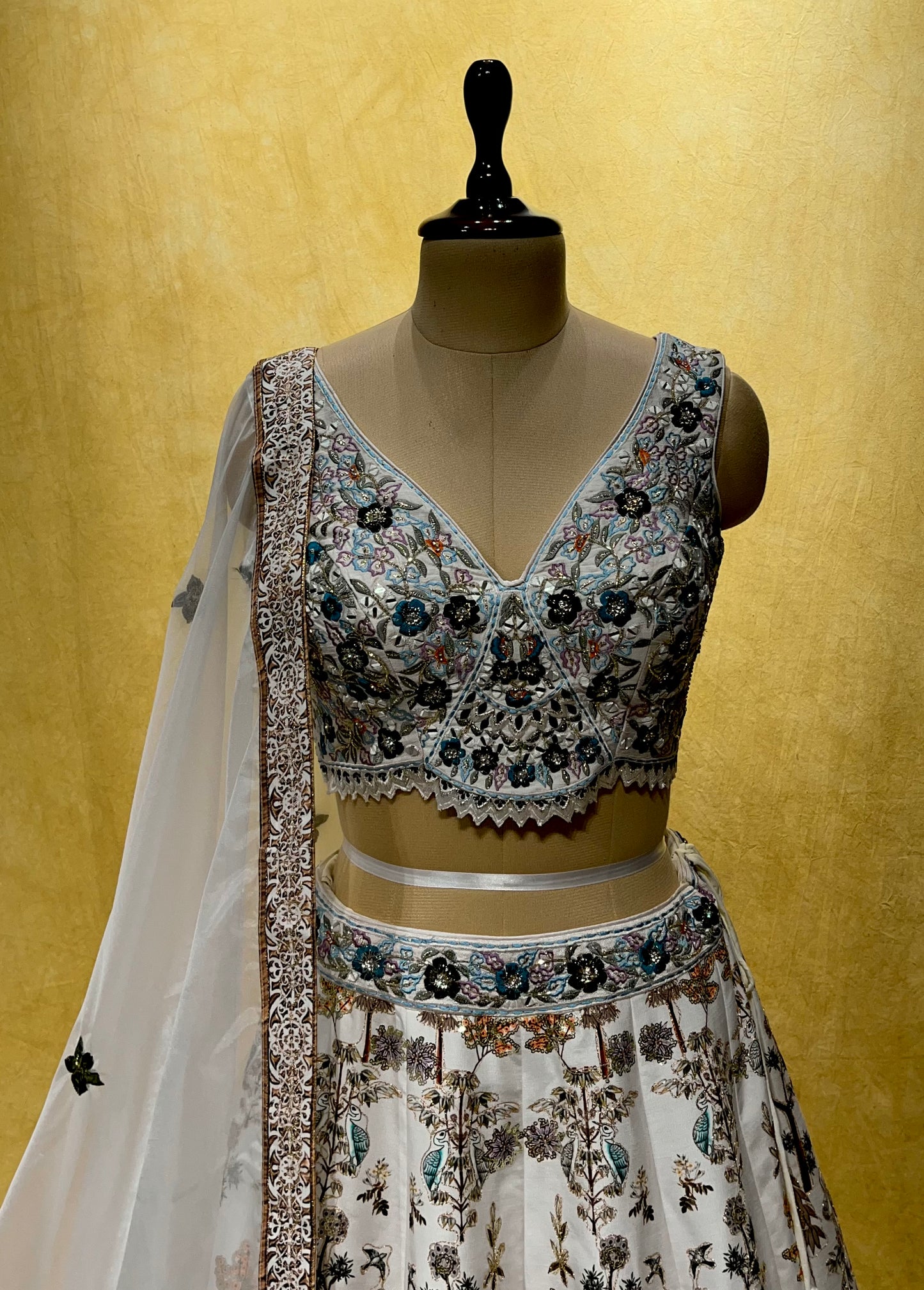 WHITE COLOR SILK LEHENGA WITH CROP TOP BLOUSE & ORGANZA DUPATTA EMBELLISHED WITH MIRROR, SEQUINS & AARI WORK ( WHITE LEHENGA PARTY WEAR )