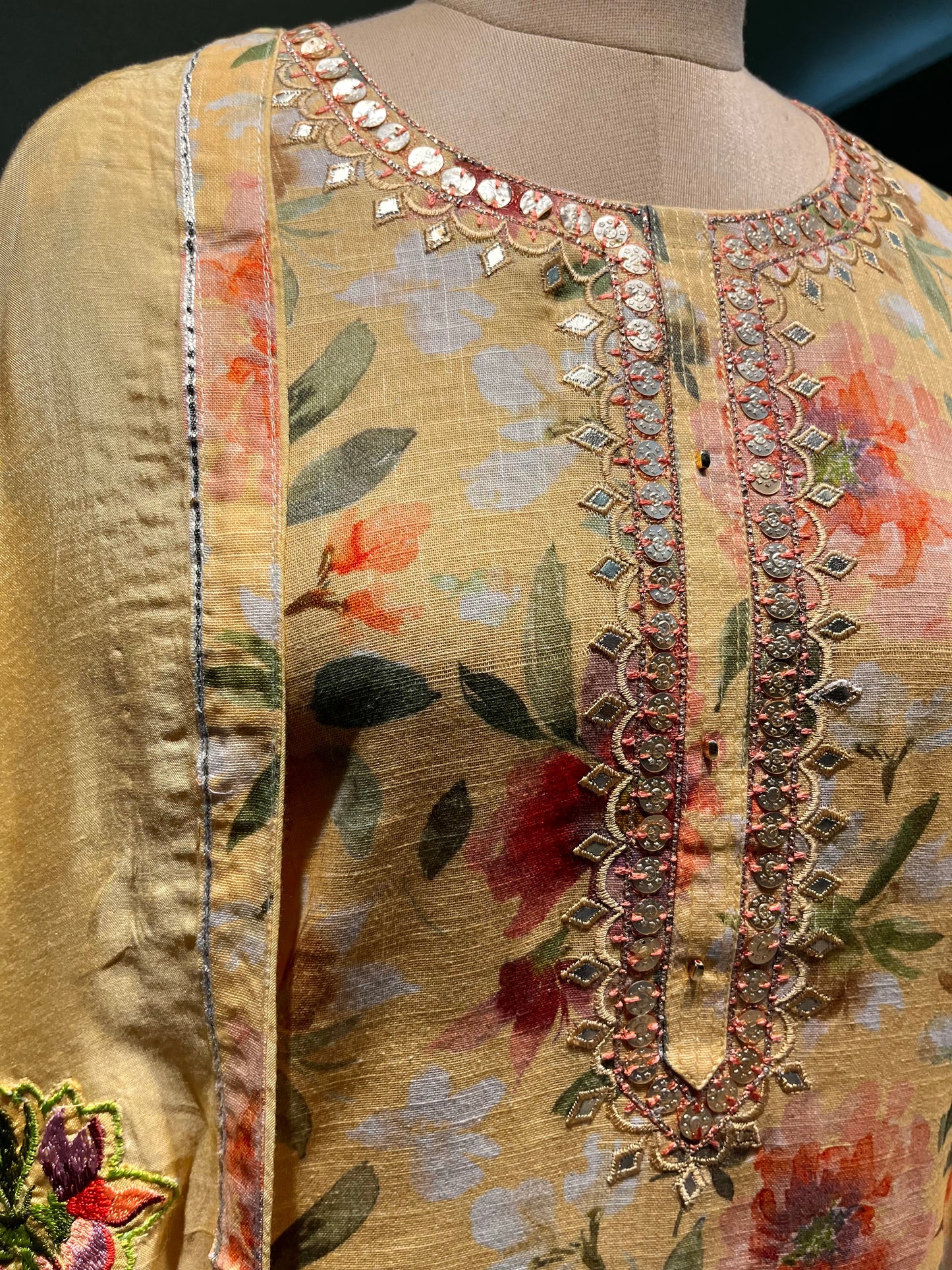 YELLOW COLOUR LINEN UNSTITCHED SUIT EMBELLISHED WITH RESHAM & MIRROR FOIL WORK