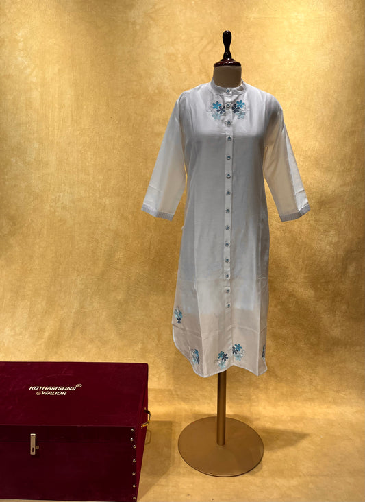 WHITE COLOUR CHANDERI SILK EMBROIDERED KURTI EMBELLISHED WITH FLORAL RESHAM EMBROIDERY BY SIDDHAIKA
