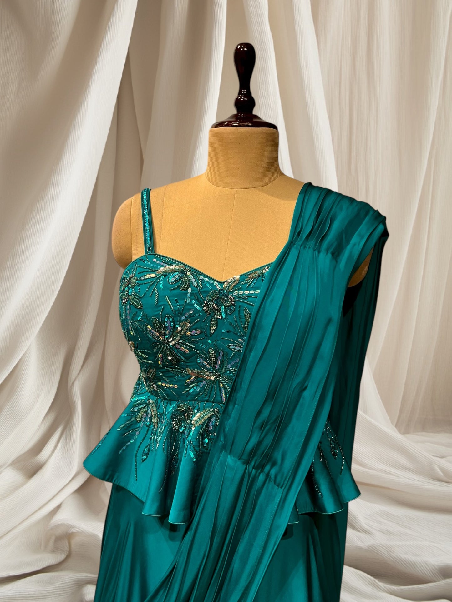 TURQUOISE COLOUR SATIN SILK INDOWESTERN DRESS PEPLUM TOP WITH ATTACH DUPATTA SKIRT EMBELLIESHED WITH CUTDANA, BEADS & SEQUINS WORK