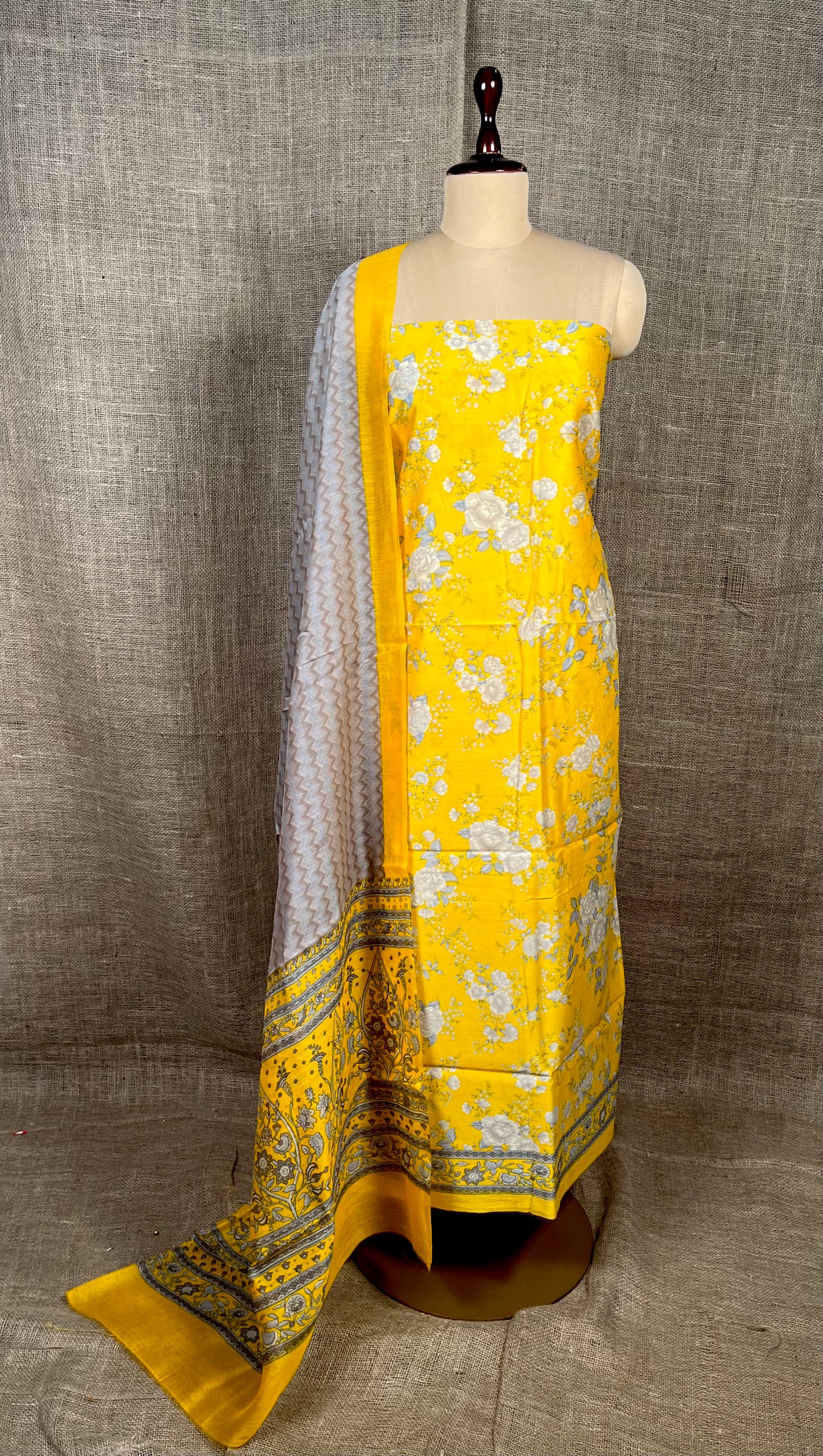 YELLOW COLOUR CHANDERI SILK PRINTED UNSTITCHED SUIT