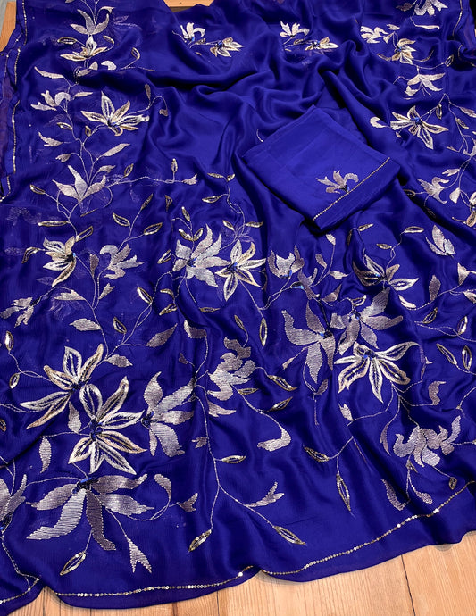 ( DELIVERY IN 20-25 DAYS ) BLUE COLOUR PURE CHIFFON HAND EMBROIDERED SAREE EMBELLISHED WITH AARI, SEQUINS & CUTDANA WORK