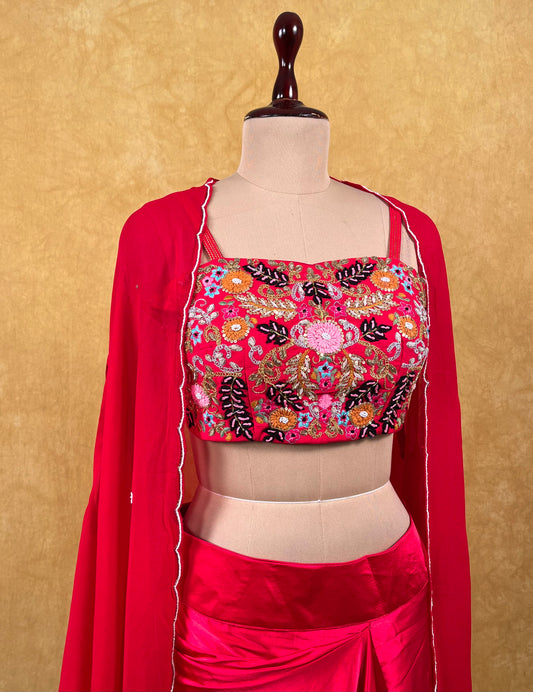 HOT PINK COLOUR SATIN SILK DRAPE SKIRT WITH EMBROIDERED BLOUSE & GEORGETTE SHRUG EMBELLISHED WITH ZARDOZI, SEQUINS & THREAD WORK