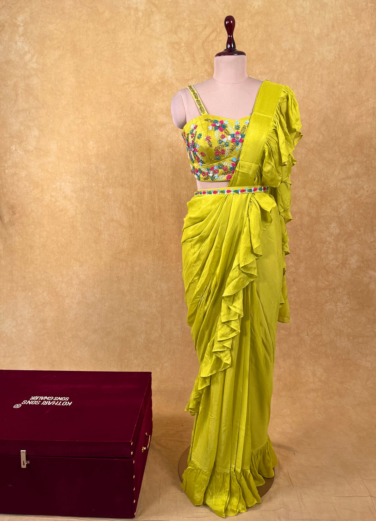 PARROT GREEN COLOUR CHINON RUFFLE SAREE WITH READYMADE EMBROIDERED BLOUSE & BELT EMBELLISHED WITH BEADS & SEQUINS WORK