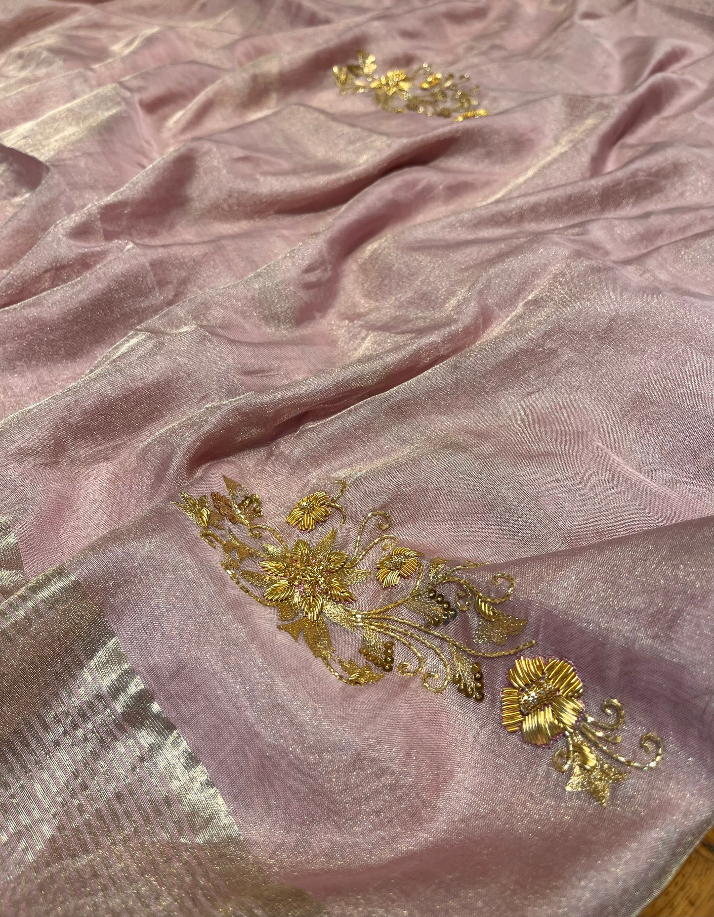 MAUVE COLOUR CHANDERI TISSUE HAND EMBROIDERED SAREE EMBELLISHED WITH AARI, ZARDOZI & CUTDANA WORK