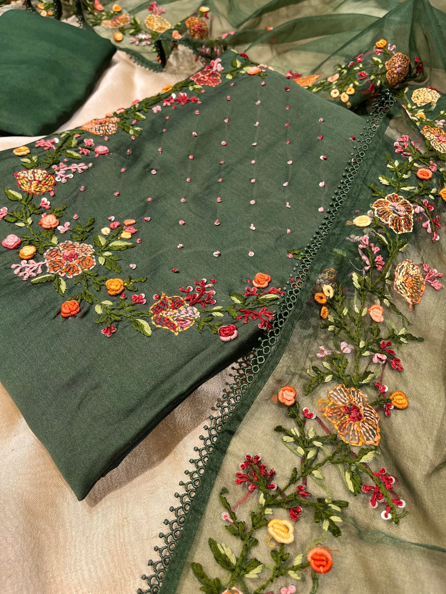 GREEN COLOUR CHANDERI SILK EMBROIDERED UNSTITCHED SUIT WITH ORGANZA DUPATTA EMBELLISHED WITH FRENCH KNOT EMBROIDERY