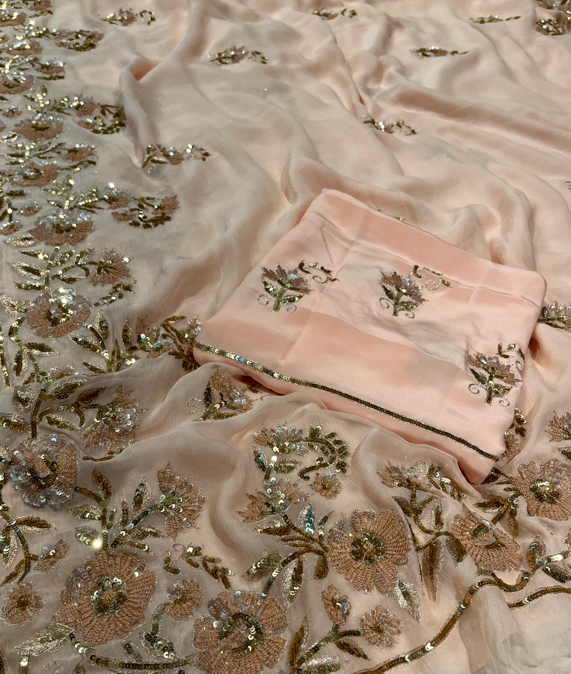 PEACH COLOUR PURE CHIFFON HAND EMBROIDERED SAREE EMBELLISHED WITH SEQUINS & AARI WORK ( DELIVERY IN 25-30 DAYS ) - Kothari Sons