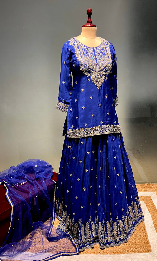 ( DELIVERY IN 25 DAYS ) BLUE COLOUE CHINON KURTA WITH CREPE SKIRT & NET DUPATTA EMBELLISHED WITH ZARI WORK