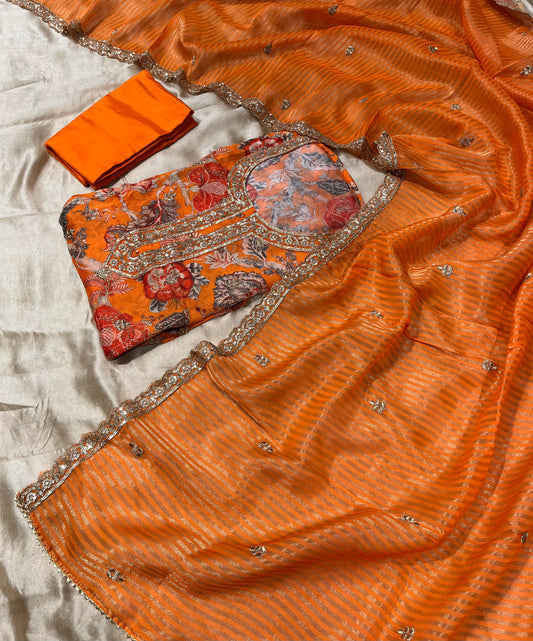 ORANGE COLOUR CHINON PRINTED UNSTITCHED SUIT WITH ORGANZA TISSUE DUPATTA EMBELLISHED WITH SEQUINS & ZARI WORK