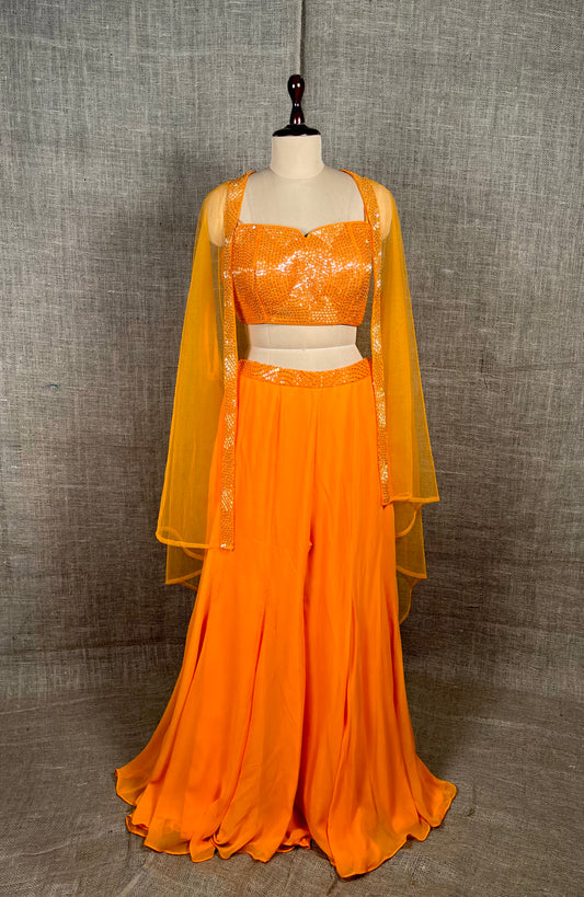 ORANGE COLOUR PALAZZO SET WITH CROP TOP BLOUSE & SHRUG EMBELLISHED WITH SEQUINS & CUTDANA WORK