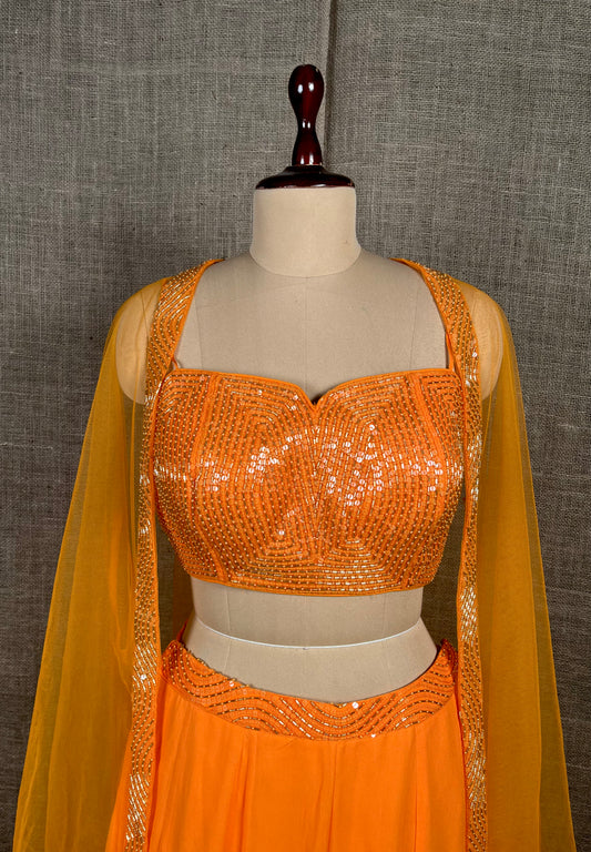 ORANGE COLOUR PALAZZO SET WITH CROP TOP BLOUSE & SHRUG EMBELLISHED WITH SEQUINS & CUTDANA WORK