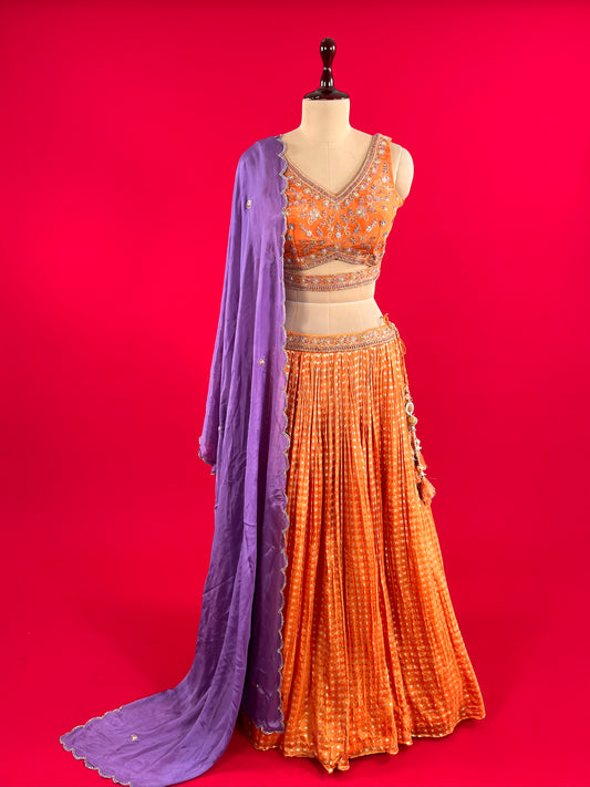 ORANGE COLOUR CHINON SKIRT WITH CROP TOP BLOUSE WITH CONTRAST DUPATTA EMBELLISHED WITH CUTDANA, SEQUINS & THREAD WORK