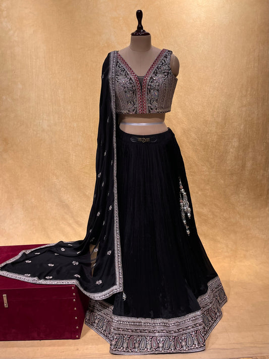 ( DELIVERY IN 25 DAYS ) BLACK COLOR CHINON LEHENGA WITH CROP TOP BLOUSE EMBELLISHED WITH ZARI, CUTDANA & SEQUINS WORK ( BLACK LEHENGA ONLINE )