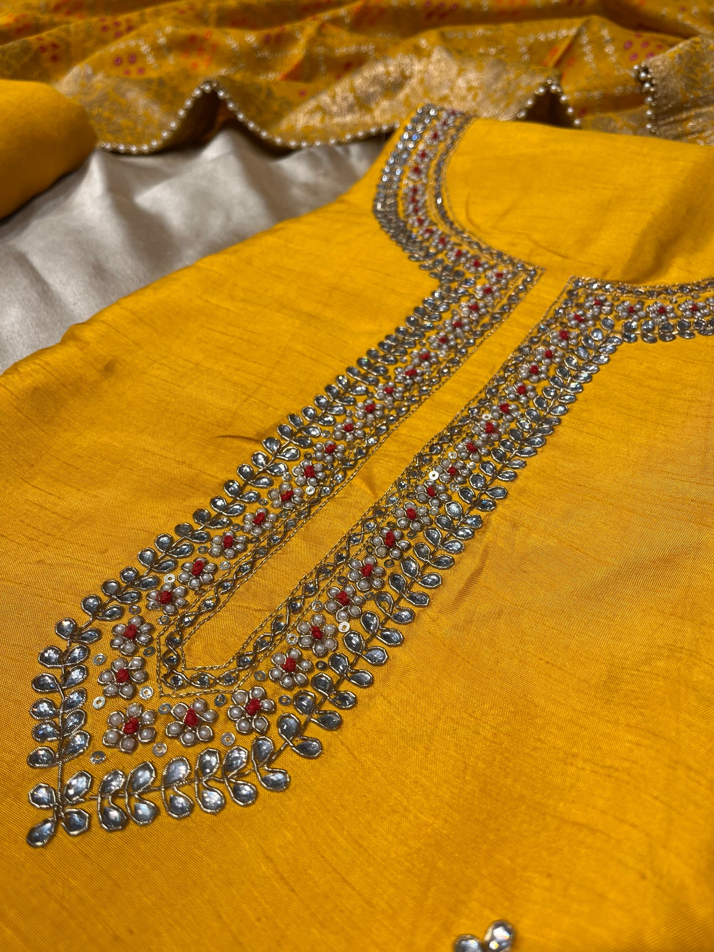 YELLOW COLOUR DOLA SILK UNSTITCHED SUIT WITH BANARASI DUPATTA EMBELLISHED WITH PEARL & ZARDOZI WORK