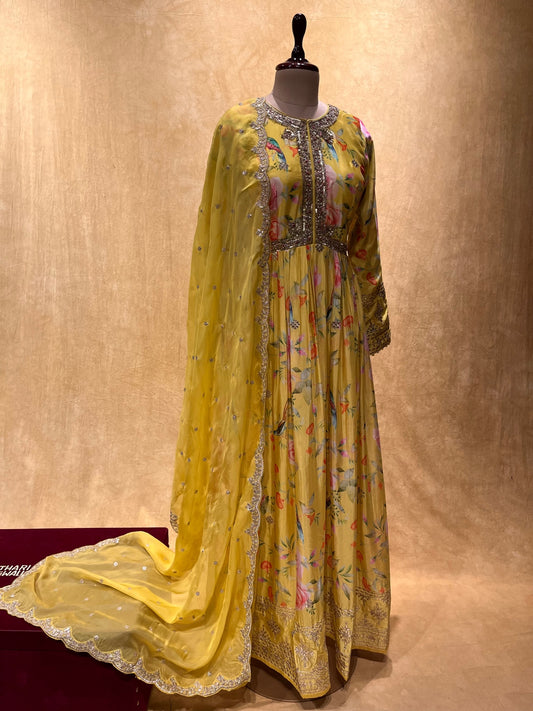 ( DELIVERY IN 25 DAYS ) YELLOW COLOUR PRINTED CHINON FLOOR LENGTH SUIT WITH ORGANZA DUPATTA EMBELLISHED WITH ZARI EMBROIDERY