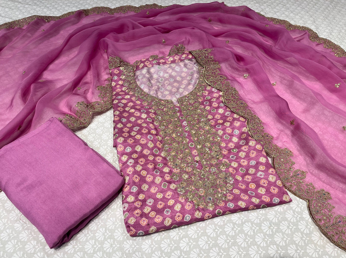 PURPLE ORCHID COLOUR MUSLIN SILK UNSTITCHED SUIT WITH ORGANZA DUPATTA EMBELLISHED WITH ZARI & SEQUINS WORK