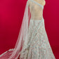 WHITE COLOUR NET SEQUINS EMBROIDERED LEHENGA WITH UNSTITCHED BLOUSE & NET DUPATTA EMBELLISHED WITH SEQUINS WORK