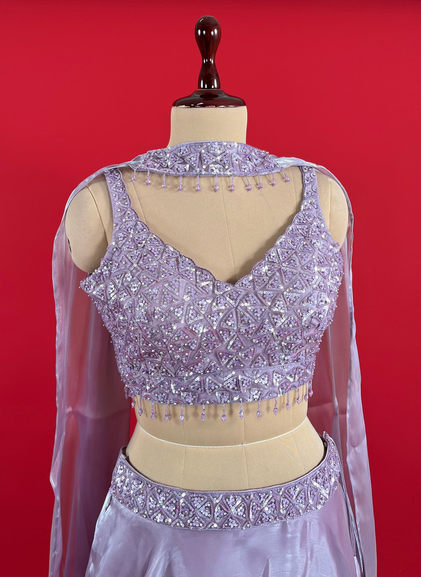 ( DELIVERY IN 25 DAYS ) LAVENDER COLOUR TISSUE SKIRT WITH EMBROIDERED CROP TOP EMBELLISHED WITH SEQUINS WORK
