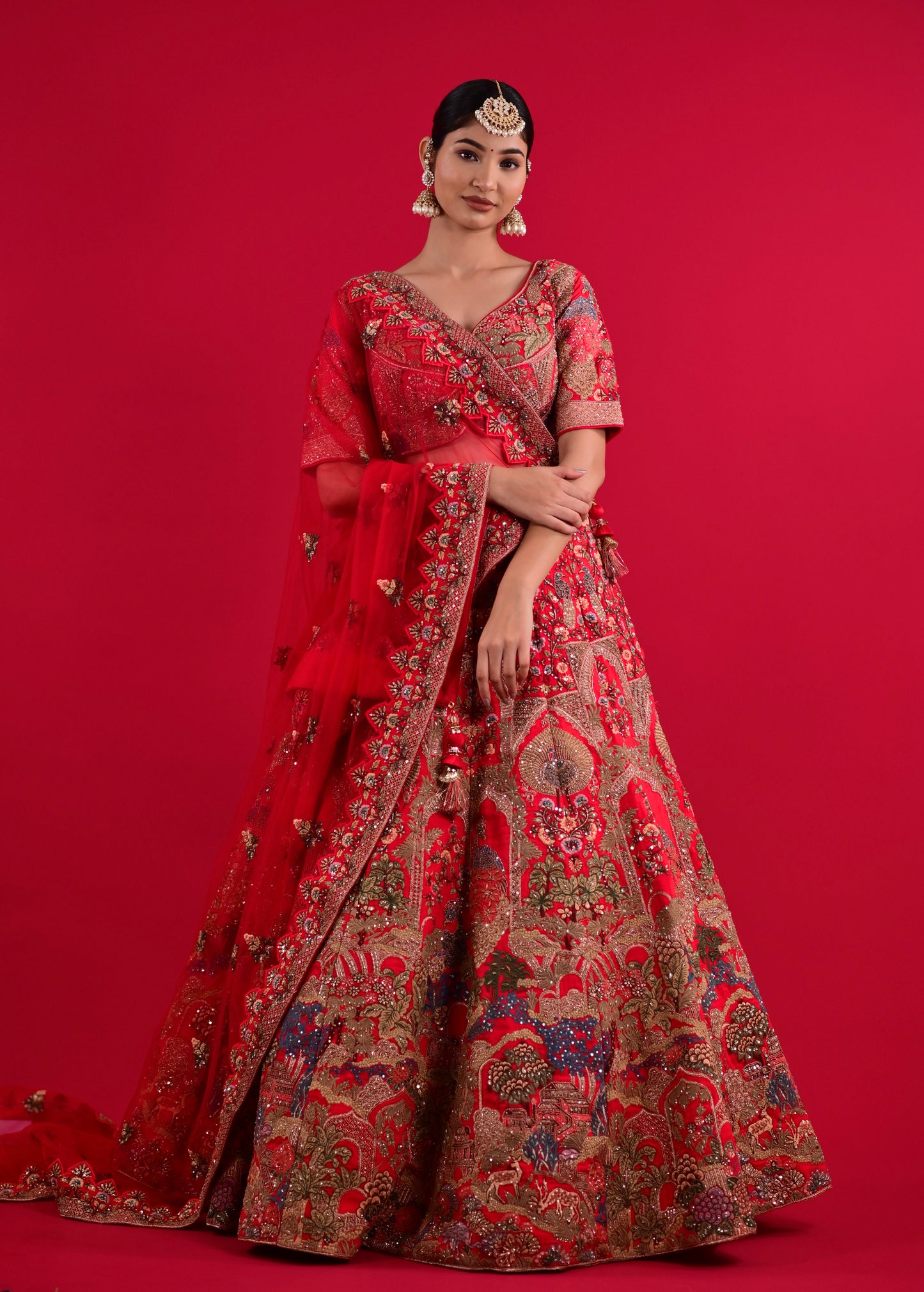 ( DELIVERY IN 25 DAYS ) RED COLOUR SILK WEDDING HAND EMBROIDERED LEHENGA WITH READYMADE BLOUSE & NET DUPATTA EMBELLISHED WITH RESHAM, CUTDANA & SEQUINS WORK