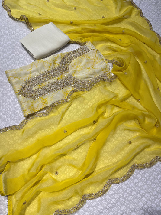 YELLOW COLOUR ORGANZA UNSTITCHED SUIT EMBELLISHED WITH MIRROR & ZARI WORK