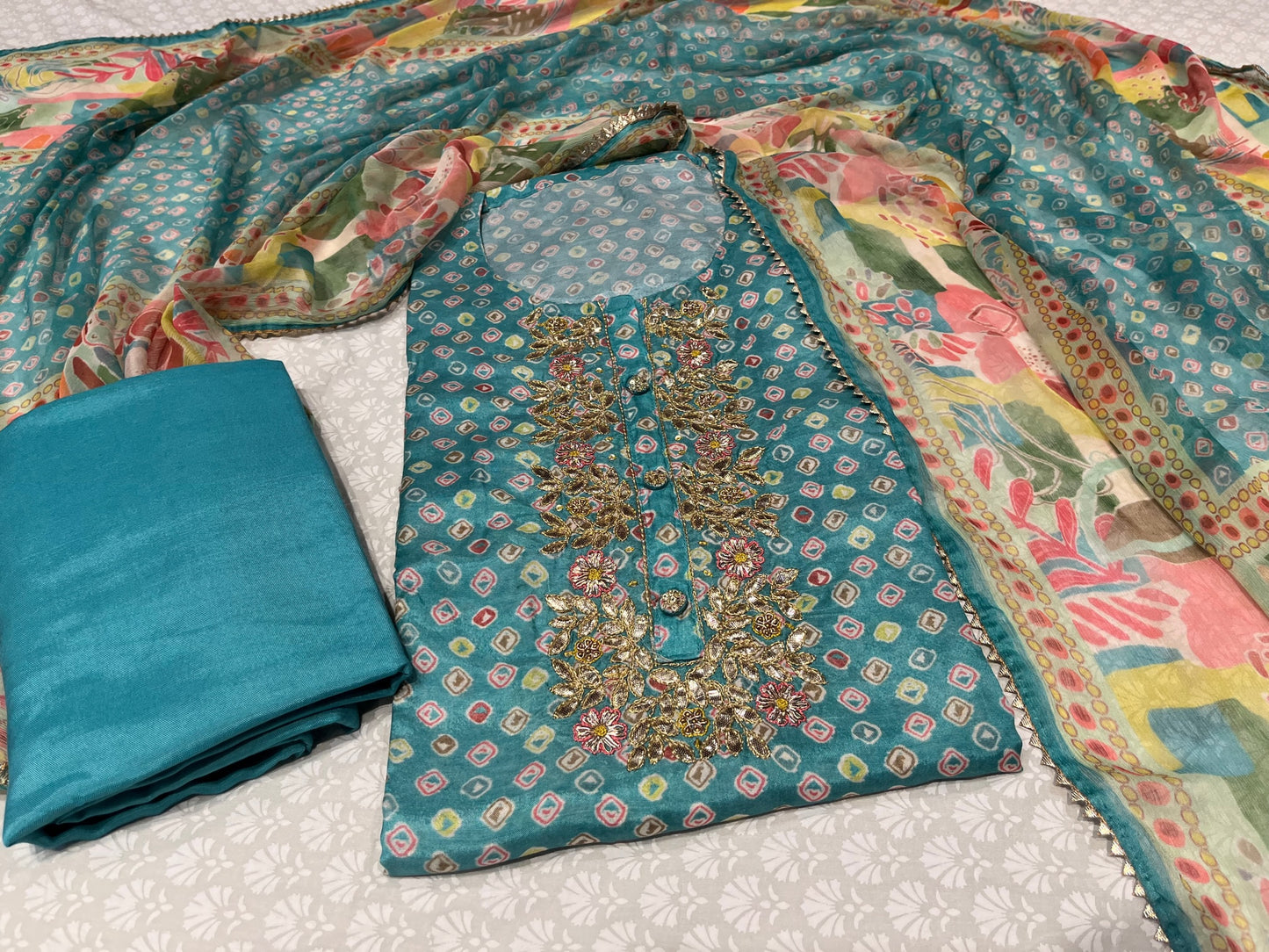 TURQUOISE BLUE COLOUR MUSLIN SILK UNSTITCHED SUIT WITH CHIFFON DUPATTA EMBELLISHED WITH GOTA PATTI WORK