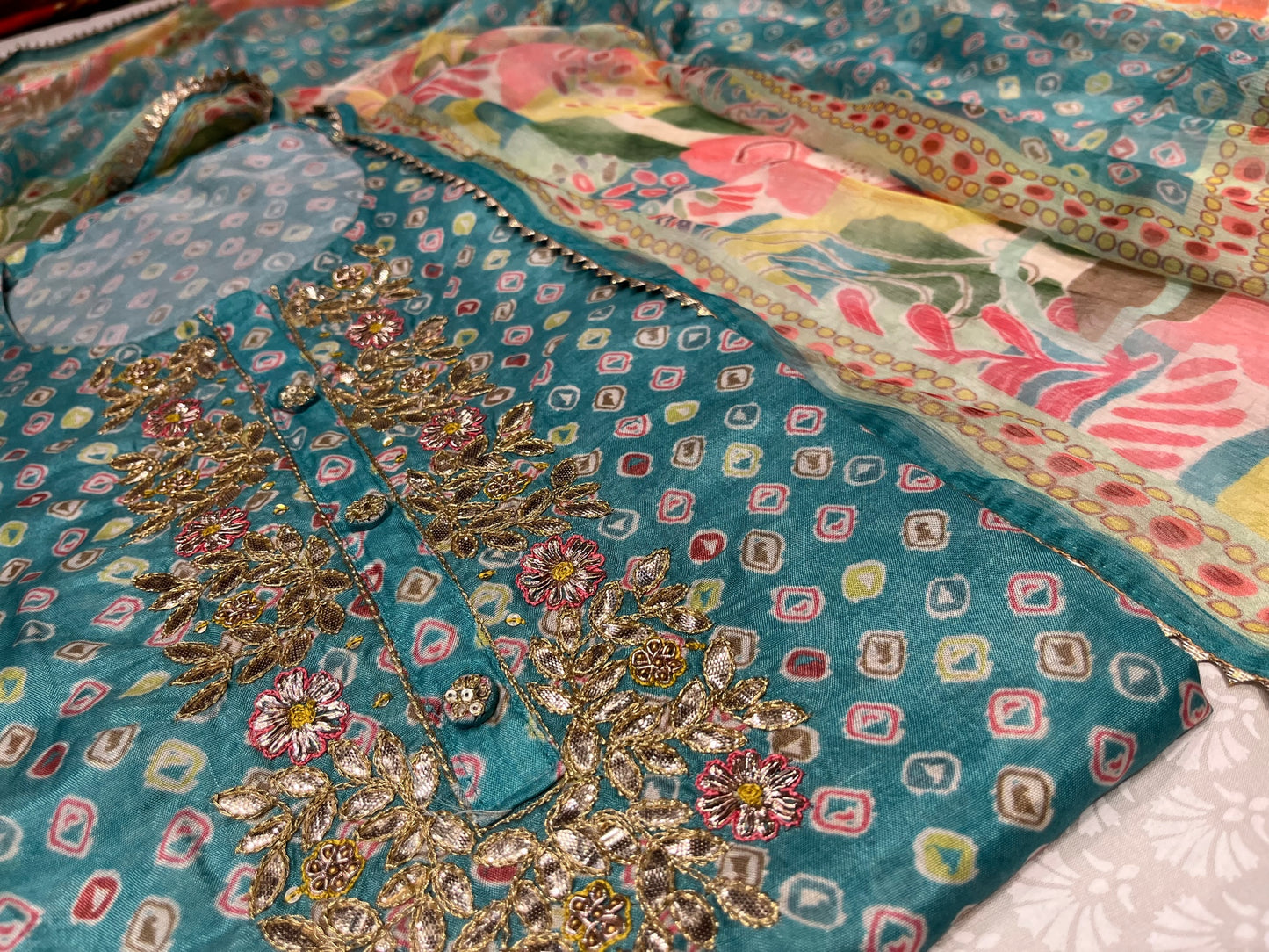 TURQUOISE BLUE COLOUR MUSLIN SILK UNSTITCHED SUIT WITH CHIFFON DUPATTA EMBELLISHED WITH GOTA PATTI WORK